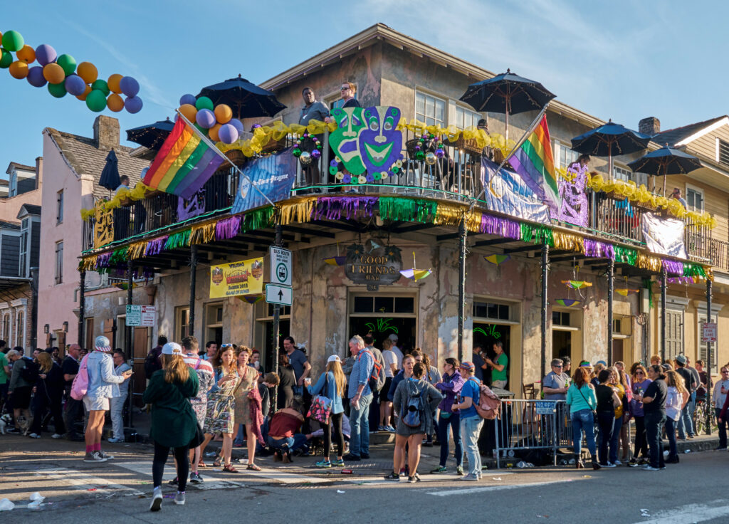 A picture in front of the Good Friends Bar in New Orleans, Louisiana during Mardi Gras.